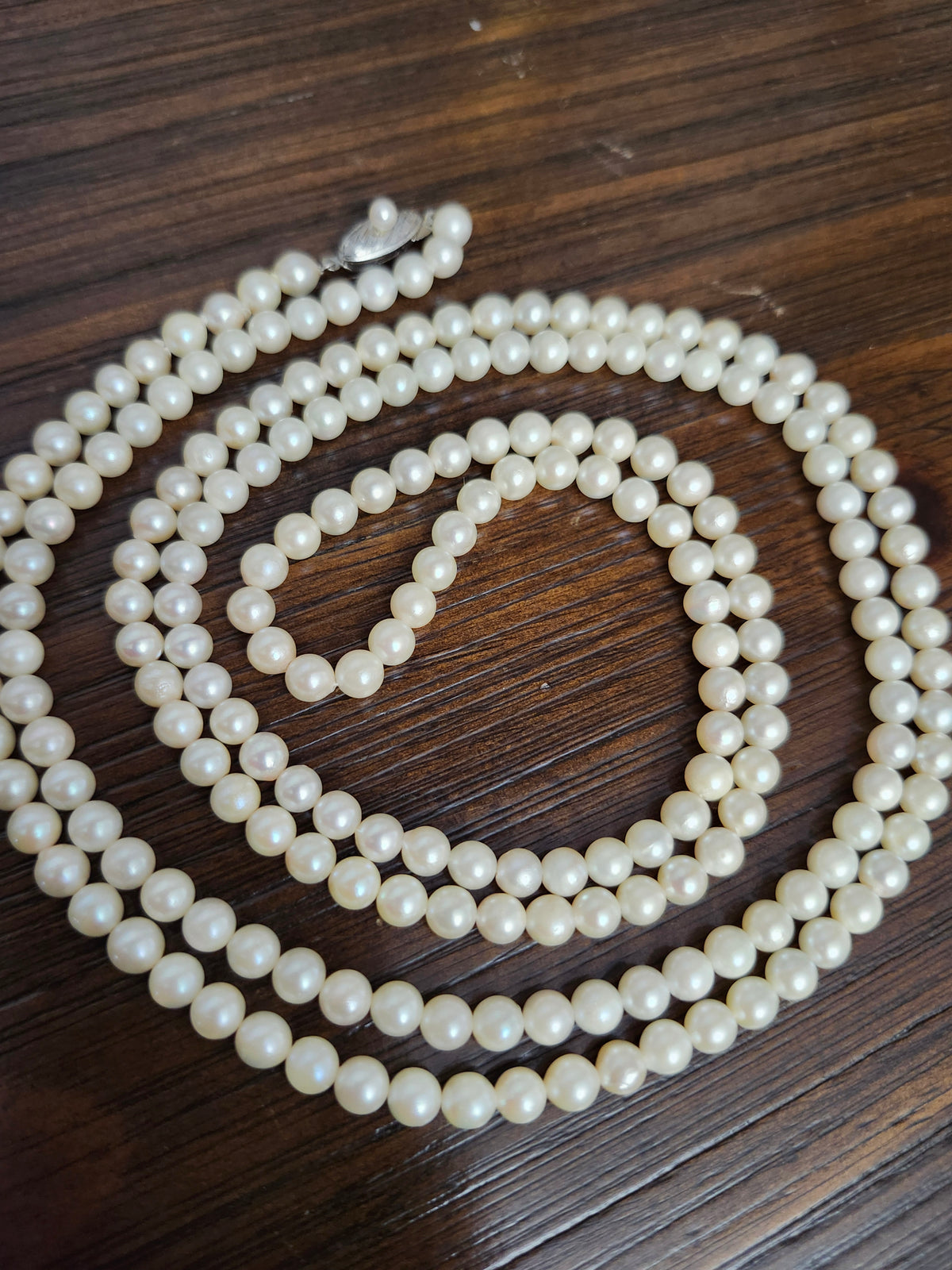 Pearl Strand Necklace 49" long, 58.3 grams, 5.7 mm Pearls