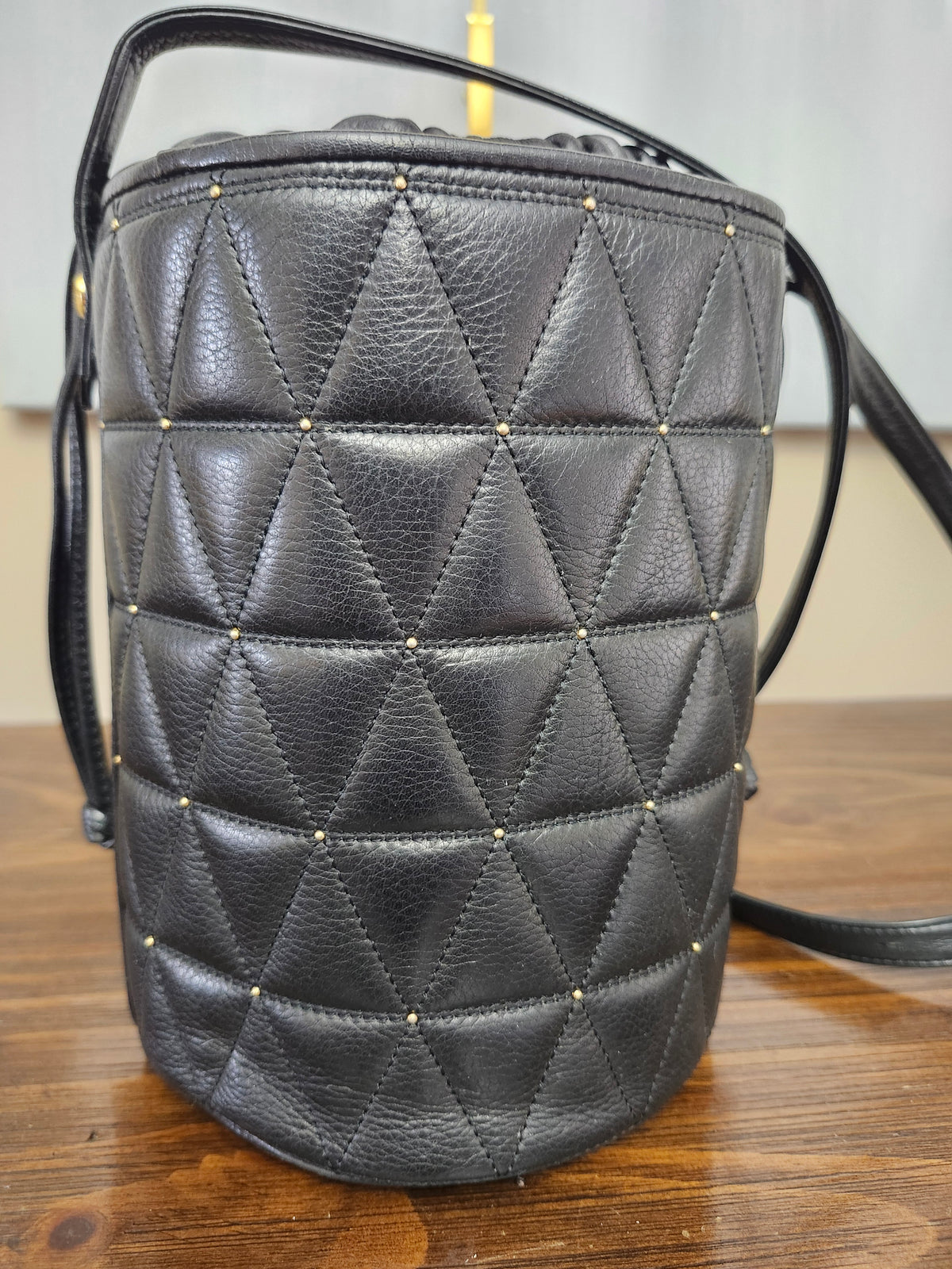 Valentino Garavani Micro Rockstud Calfskin Bucket Bag in Black