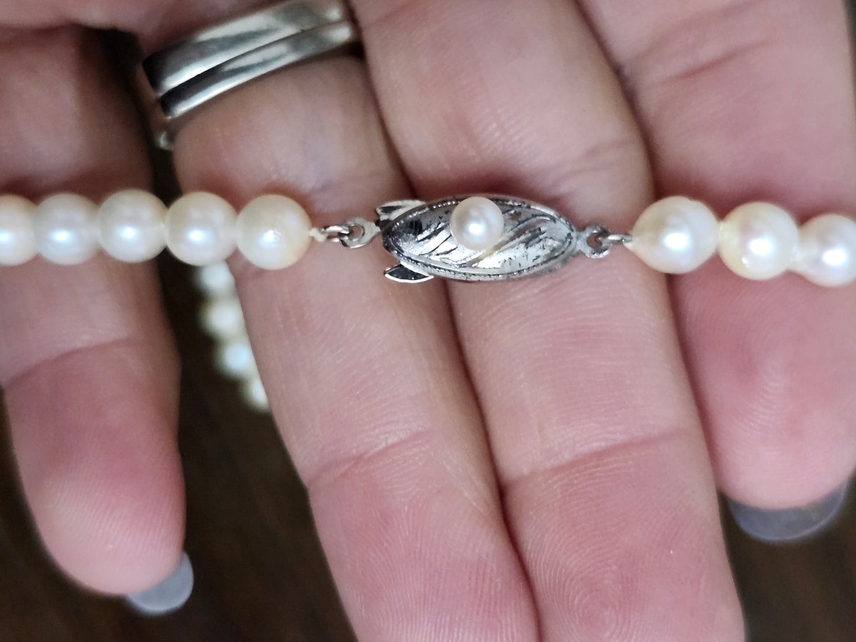 Pearl Strand Necklace 49" long, 58.3 grams, 5.7 mm Pearls