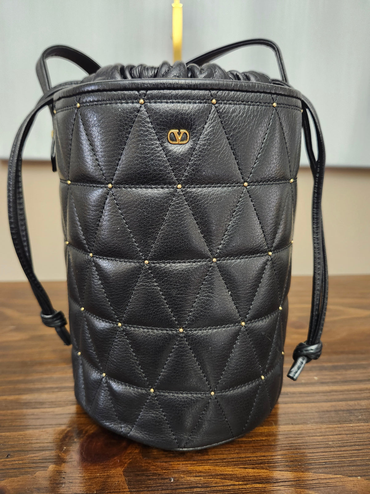 Valentino Garavani Micro Rockstud Calfskin Bucket Bag in Black