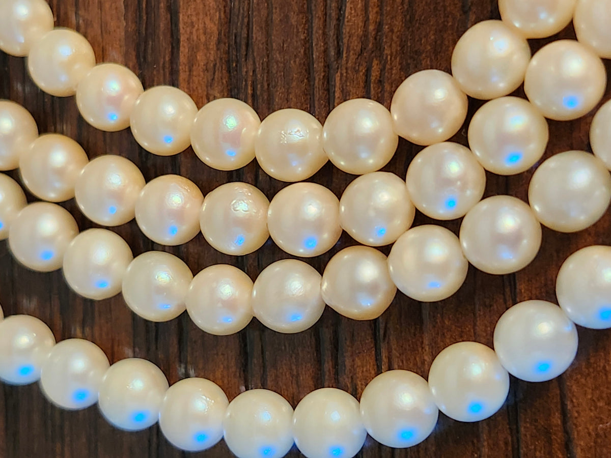 Pearl Strand Necklace 49" long, 58.3 grams, 5.7 mm Pearls